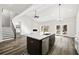 Spacious kitchen island with quartz countertop and stainless steel appliances at 4374 Westside Nw Dr, Acworth, GA 30101