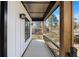 View of a spacious covered porch area, featuring wood columns and metal railings at 4374 Westside Nw Dr, Acworth, GA 30101