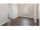 Bright dining room featuring durable dark hardwood flooring, chandelier, and a window at 2753 Wedgewood Ter, Decatur, GA 30032
