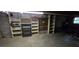 Basement with shelving units offers ample storage space and functionality at 3640 Chandler Haulk Rd, Loganville, GA 30052