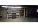 Basement with shelving units offers ample storage space and functionality at 3640 Chandler Haulk Rd, Loganville, GA 30052