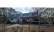 Charming single-Gathering home featuring a welcoming front porch, dormer windows, and a well-maintained lawn at 3640 Chandler Haulk Rd, Loganville, GA 30052