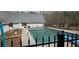 Outdoor swimming pool with surrounding deck and fencing provides a private and relaxing retreat at 3640 Chandler Haulk Rd, Loganville, GA 30052