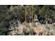 Aerial view showcasing the property's location within a tranquil neighborhood setting, outlined in yellow at 424 Cannonball Ct, Stockbridge, GA 30281
