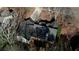 Aerial view of a home featuring a dark shingled roof and partially covered porch at 424 Cannonball Ct, Stockbridge, GA 30281