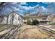 Backyard featuring a large deck, complemented by the natural beauty of the surrounding landscape at 424 Cannonball Ct, Stockbridge, GA 30281