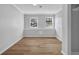 Bright bedroom with hardwood floors and double windows allowing for natural light at 2390 Amberbrook Sw Dr, Conyers, GA 30094
