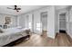 Sunlit main bedroom with en-suite bathroom and walk-in closet at 2390 Amberbrook Sw Dr, Conyers, GA 30094