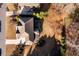 Aerial view of the beautiful single Gathering home with mature trees and pristine landscaping at 5230 Harris Springs Dr, Cumming, GA 30040