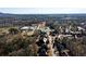 An aerial shot captures a beautiful house next to well kept sport facilities at 5230 Harris Springs Dr, Cumming, GA 30040