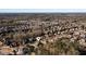 An aerial view shows the neighborhood, full of beautiful tree-covered lots and homes at 5230 Harris Springs Dr, Cumming, GA 30040