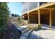 A beautiful outdoor staircase and stone pathway adds appeal to the exterior of this home at 5230 Harris Springs Dr, Cumming, GA 30040