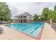 A large swimming pool with lounge chairs offers a perfect spot for relaxation and recreation at 5230 Harris Springs Dr, Cumming, GA 30040