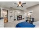 Bedroom featuring carpet, ceiling fan, natural light, closet, and neutral paint at 12065 Wexford Club Dr, Roswell, GA 30075