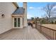 Expansive deck with railing, ideal for enjoying the backyard scenery and outdoor grilling at 12065 Wexford Club Dr, Roswell, GA 30075