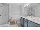 Stylish bathroom showcasing a glass shower, bathtub, and double sink vanity at 2740 Bell Se Dr, Smyrna, GA 30080