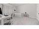 This bedroom features neutral walls, carpet, a daybed, a desk and a side table at 2740 Bell Se Dr, Smyrna, GA 30080