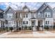 Charming townhome exterior featuring a well-manicured lawn and inviting front porches at 2740 Bell Se Dr, Smyrna, GA 30080