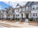 Attractive townhome row with black metal fences, well-kept lawns, and inviting front entrances at 2740 Bell Se Dr, Smyrna, GA 30080