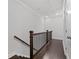 View of wooden hallway floor and railings leading to the stairway at 2740 Bell Se Dr, Smyrna, GA 30080