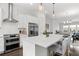 Contemporary kitchen featuring stainless steel appliances, a quartz island, and a seamless design at 2740 Bell Se Dr, Smyrna, GA 30080