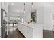 Open concept kitchen with large island, stainless steel appliances, and a view to the living area at 2740 Bell Se Dr, Smyrna, GA 30080