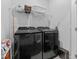 Well-organized laundry room with modern front load washer and dryer units at 2740 Bell Se Dr, Smyrna, GA 30080