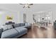 Open floor plan featuring hardwood floors, an open staircase, and a comfortable blue couch at 2740 Bell Se Dr, Smyrna, GA 30080