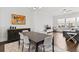 Open concept living room and dining room with hardwood floors and lots of natural light at 2740 Bell Se Dr, Smyrna, GA 30080