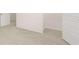Bright bedroom with neutral carpet and view to adjoining rooms at 604 Kimberwick Dr, Locust Grove, GA 30248