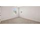 Neutral bedroom with carpet, one window and a walk-in closet at 604 Kimberwick Dr, Locust Grove, GA 30248