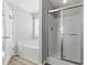 Bathroom featuring a soaking tub, separate shower, and tile flooring at 840 Franklin Mill Trce, Loganville, GA 30052