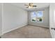 Bright bedroom with natural light, carpet flooring, and neutral colored walls at 840 Franklin Mill Trce, Loganville, GA 30052