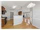 A modern kitchen with stainless steel appliances opens to a bright living area at 840 Franklin Mill Trce, Loganville, GA 30052