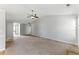 Spacious living room with neutral decor and a glimpse into the backyard at 840 Franklin Mill Trce, Loganville, GA 30052