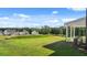 A spacious backyard with lush greenery and an expansive view at 1088 Blue Juniper Cir, Loganville, GA 30052