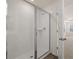 Bathroom features glass enclosed shower with subway tile and tile floor at 1088 Blue Juniper Cir, Loganville, GA 30052