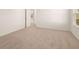 An expansive bedroom with neutral carpet and an abundance of natural light at 1088 Blue Juniper Cir, Loganville, GA 30052