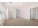 A bright bedroom with ample closet space and an attached bathroom at 1088 Blue Juniper Cir, Loganville, GA 30052