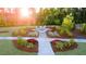 Community firepit area featuring landscaped surroundings and comfortable seating for residents at 1088 Blue Juniper Cir, Loganville, GA 30052