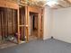 Basement area with a combination of unfinished and partially finished elements, offering flexible space at 2530 Gold Creek Ln, Cumming, GA 30041