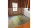 Unfinished basement area with a window, some wall paneling, and a concrete floor at 2530 Gold Creek Ln, Cumming, GA 30041