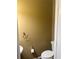 Cozy half bathroom with a sink and toilet at 2530 Gold Creek Ln, Cumming, GA 30041