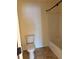 Standard bathroom with toilet and shower/tub and neutral tile flooring at 2530 Gold Creek Ln, Cumming, GA 30041