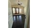 Bright bedroom with large windows, hardwood floors, and a ceiling fan at 2530 Gold Creek Ln, Cumming, GA 30041