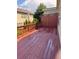 Exterior shot of the backyard deck featuring a painted wooden floor at 2530 Gold Creek Ln, Cumming, GA 30041