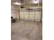 Spacious two-car garage with ample room for parking and storage, illuminated by overhead lighting at 2530 Gold Creek Ln, Cumming, GA 30041