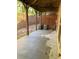 Covered back patio with concrete flooring and a view of the yard, perfect for outdoor entertaining at 2530 Gold Creek Ln, Cumming, GA 30041