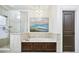 This primary bathroom features a tub with wood cabinets, a tiled shower, and modern fixtures at 4 Candler Grove Dr, Decatur, GA 30030