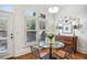 Cozy breakfast nook bathed in natural light with stylish decor and furnishings at 4 Candler Grove Dr, Decatur, GA 30030